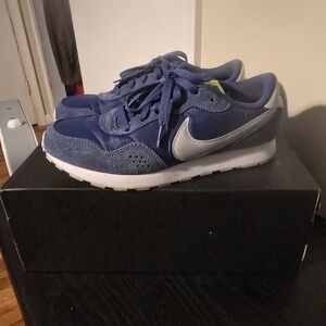 Nike Blue Sneakers with White Swoosh